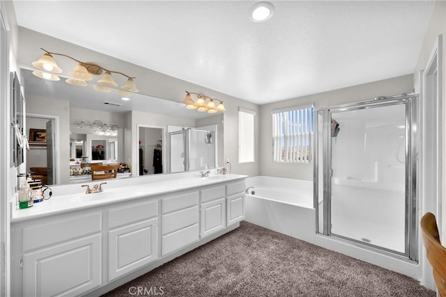 bathroom featuring carpet floors, a stall shower, double vanity, and visible vents