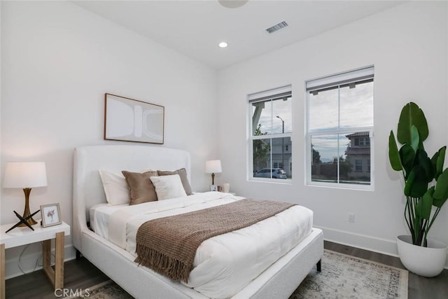 bedroom featuring hardwood / wood-style floors