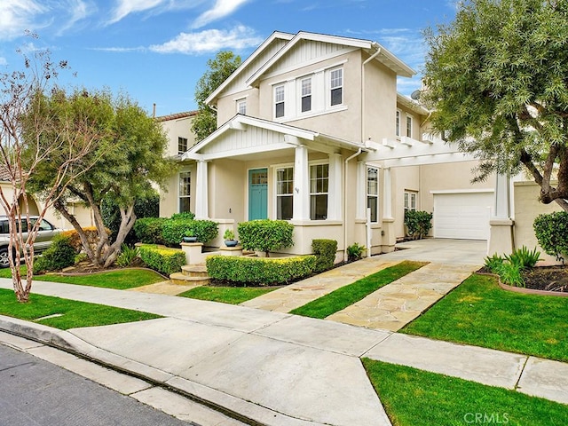 view of front facade featuring a garage and a front yard