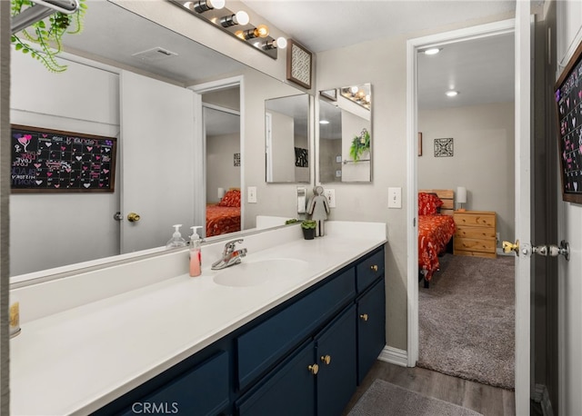 10655 Lemon Ave Unit 3706, Rancho Cucamonga, CA 91737 - bathroom featuring ensuite bathroom, vanity, and wood finished floors