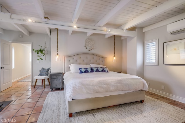 bedroom with tile patterned flooring, beam ceiling, and a wall mounted AC