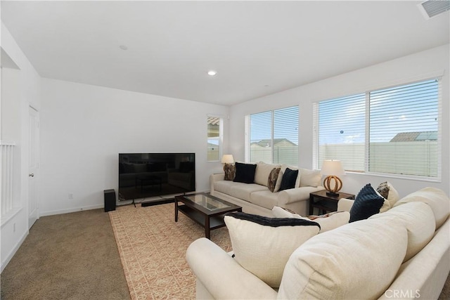 living room with light carpet, visible vents, recessed lighting, and baseboards