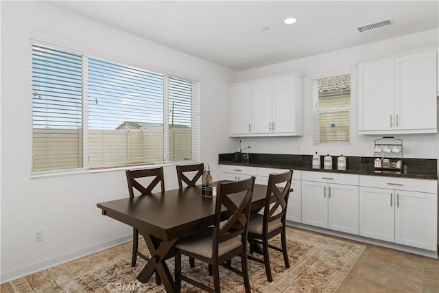 dining room featuring recessed lighting, baseboards, and visible vents