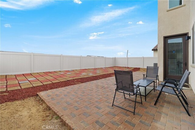 view of patio / terrace featuring a fenced backyard