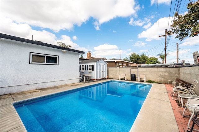 view of pool featuring a storage unit