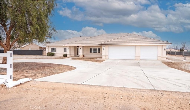 ranch-style home with a garage