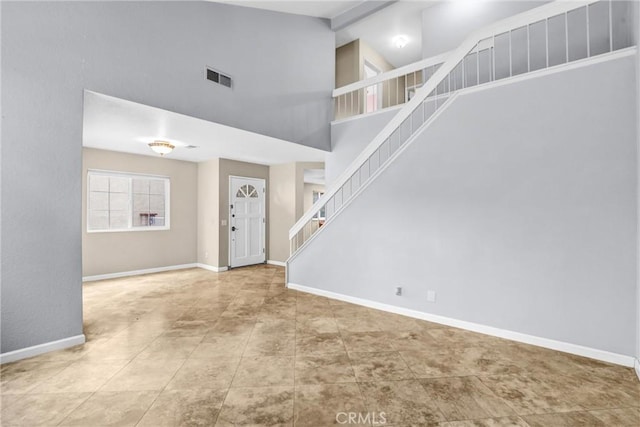 interior space featuring high vaulted ceiling