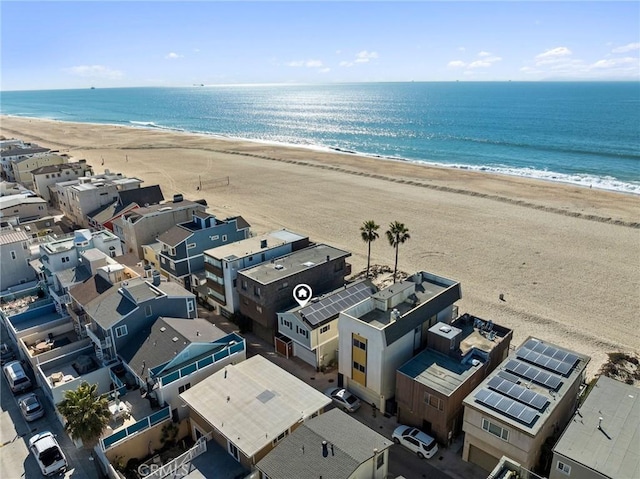 drone / aerial view with a view of the beach and a water view