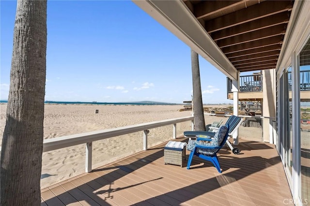 wooden deck featuring a rural view