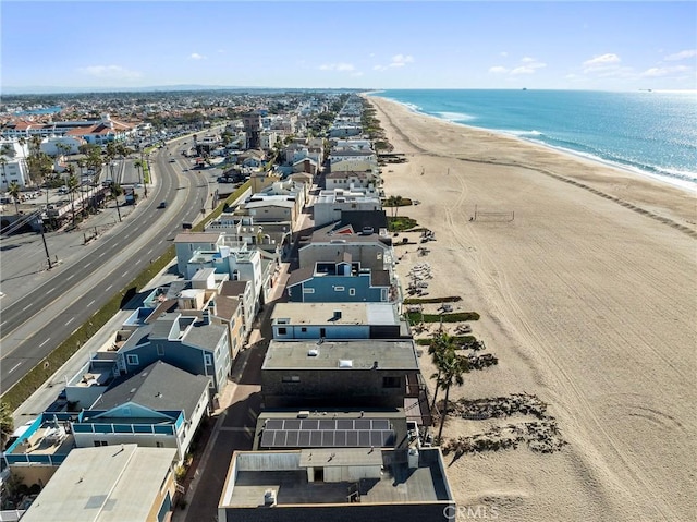 aerial view with a view of the beach and a water view