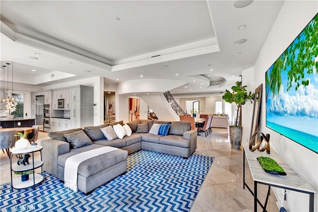 living room with a tray ceiling