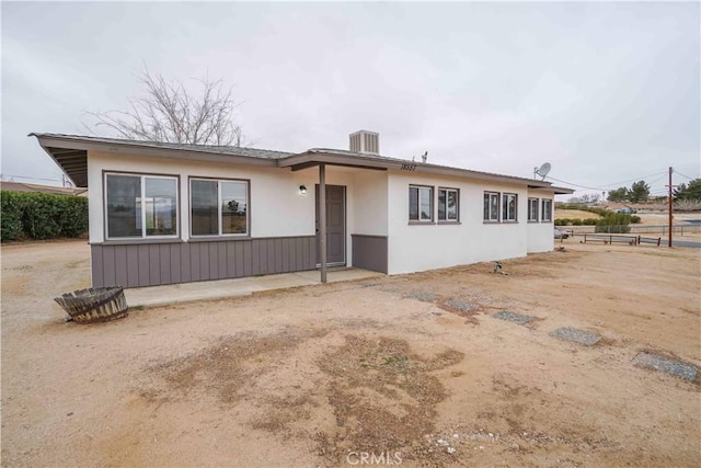 view of front of property with cooling unit