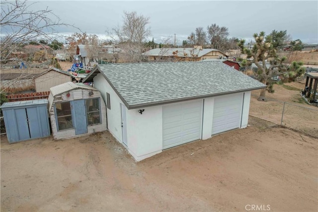 view of outdoor structure with a garage