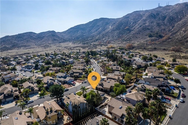 drone / aerial view featuring a mountain view