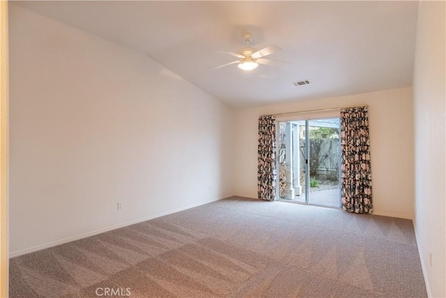 unfurnished room with lofted ceiling, light colored carpet, and ceiling fan