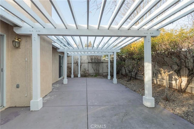 view of patio featuring a pergola