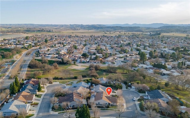 bird's eye view with a mountain view