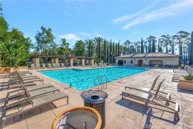 community pool featuring a patio