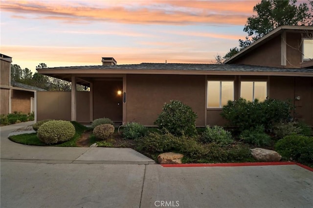 view of front of property with a patio