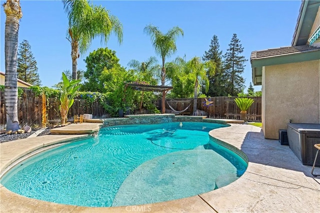 view of swimming pool with a pergola and a patio