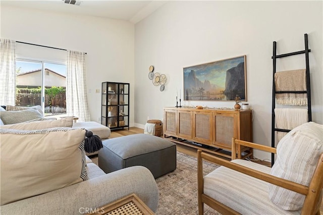 living room with light hardwood / wood-style flooring