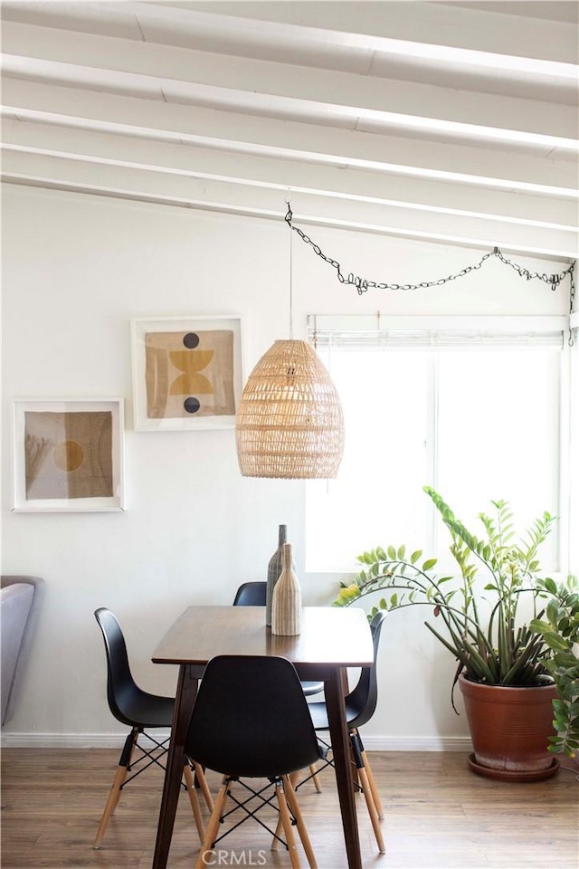 dining area with hardwood / wood-style floors