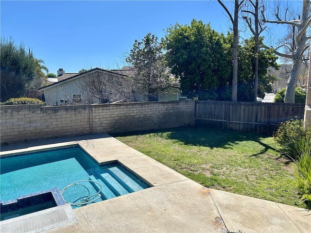 view of swimming pool with a patio, a yard, a fenced backyard, and a pool with connected hot tub