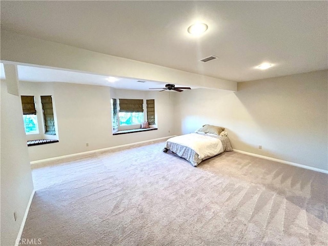 unfurnished bedroom featuring visible vents, baseboards, and carpet floors