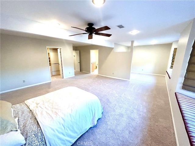 bedroom featuring carpet, visible vents, and baseboards