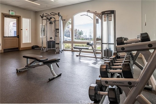 exercise room with a drop ceiling