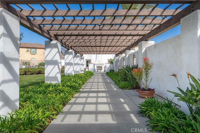 view of patio featuring a pergola