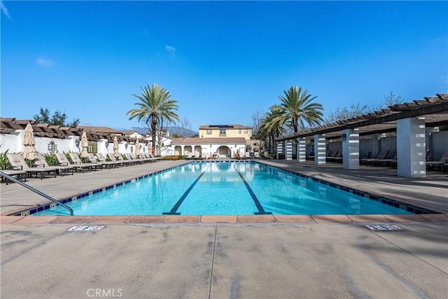 view of pool featuring a patio