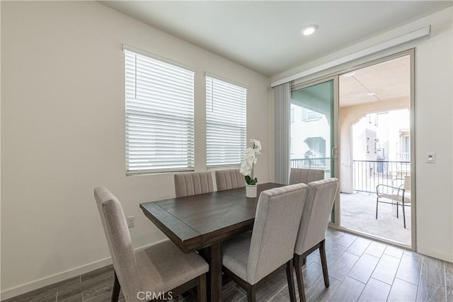 dining room with wood-type flooring