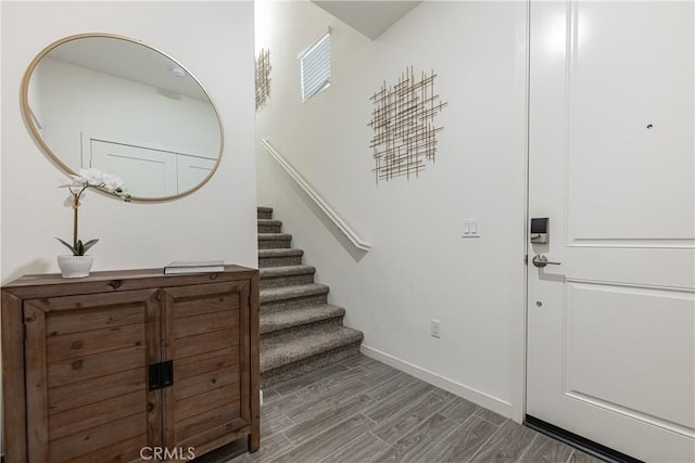 foyer entrance featuring hardwood / wood-style flooring