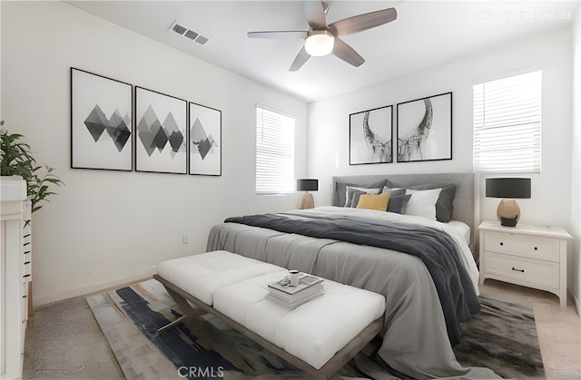 bedroom featuring ceiling fan and carpet floors