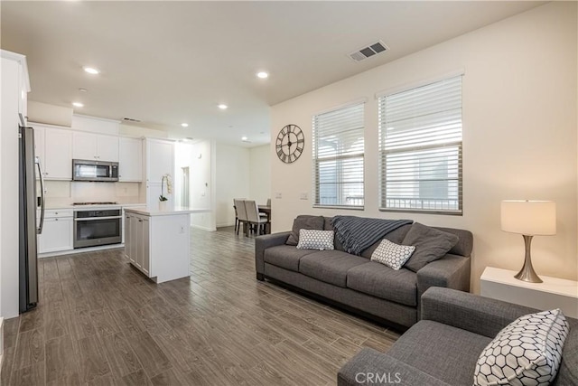 living room with hardwood / wood-style floors