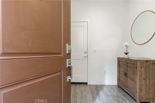 entryway with light hardwood / wood-style floors