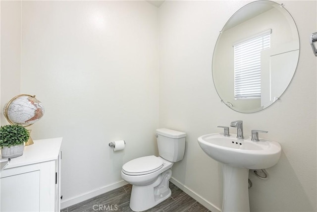 bathroom featuring toilet