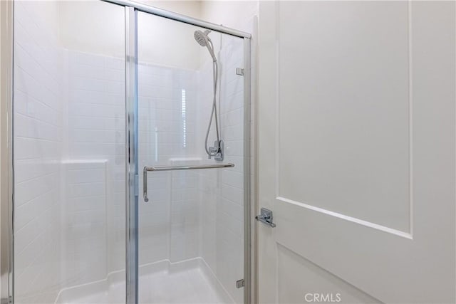 bathroom featuring walk in shower