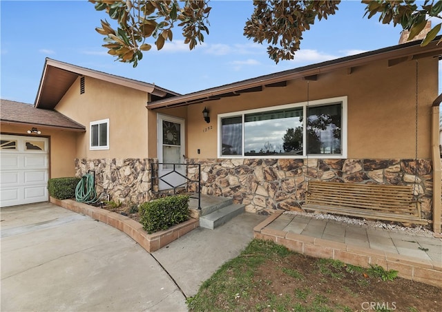 ranch-style home with a garage