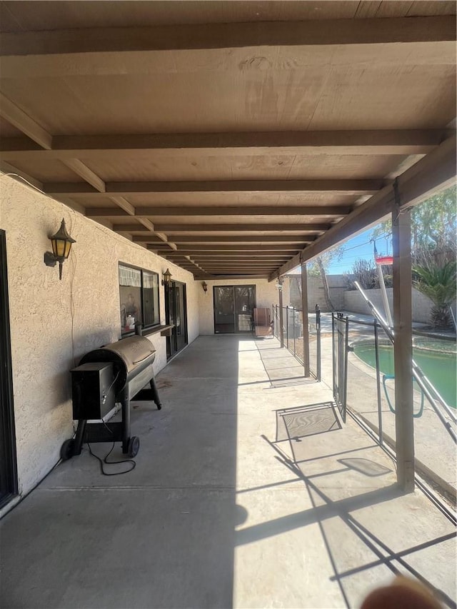 view of patio / terrace featuring a fenced in pool