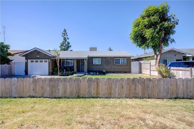 ranch-style home with a garage and a front yard