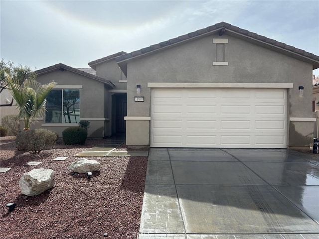 ranch-style house featuring a garage