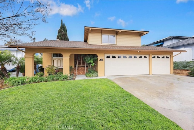 front facade with a garage and a front yard