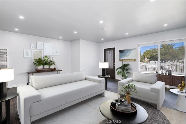 living area with recessed lighting, wood finished floors, and baseboards