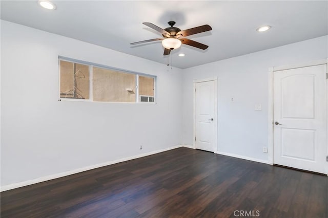 unfurnished room with recessed lighting, baseboards, a ceiling fan, and dark wood-style floors