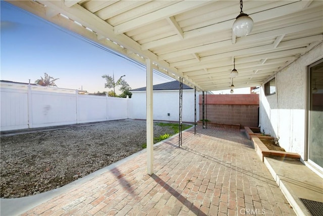 view of patio with a fenced backyard