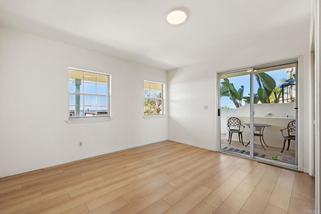 empty room featuring light hardwood / wood-style floors