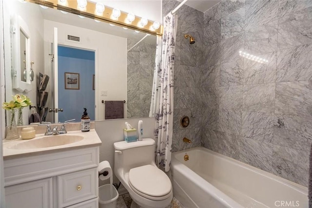 full bathroom featuring vanity, toilet, and shower / bath combo