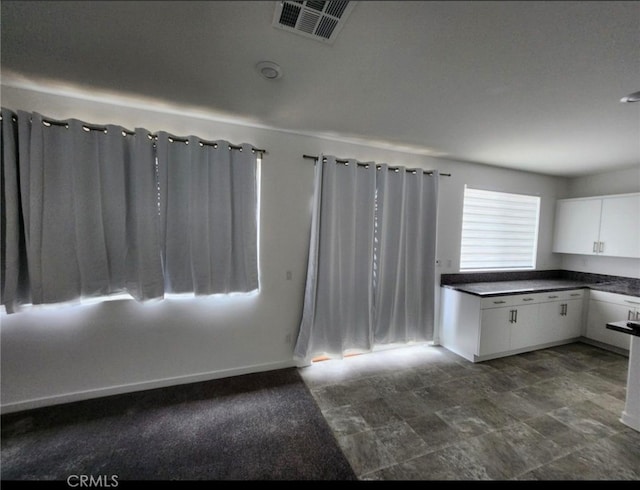 kitchen with white cabinets